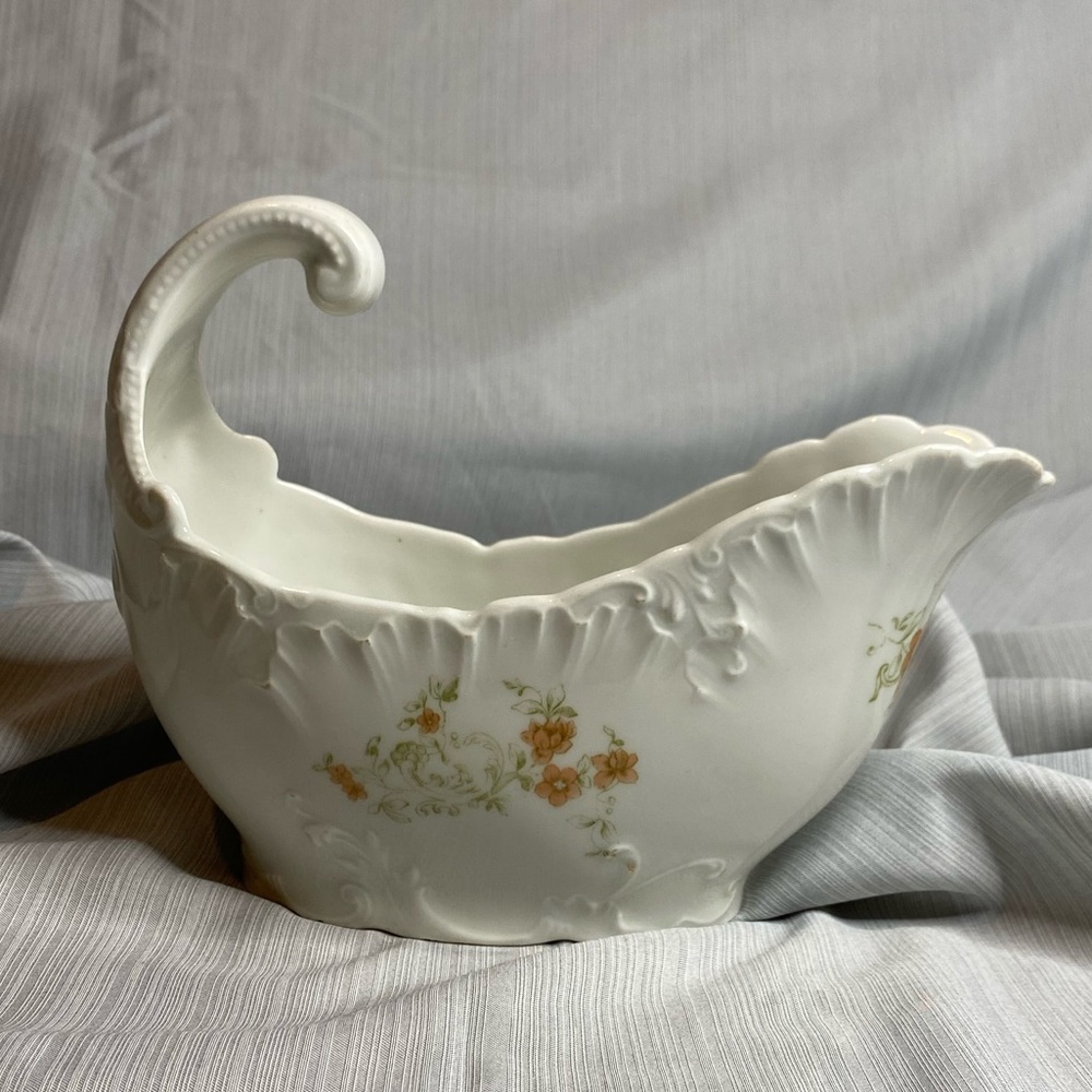 Gravy boat porcelain flower pattern hand painted.